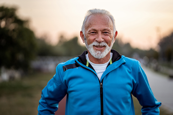 Portrait of active senior man smiling